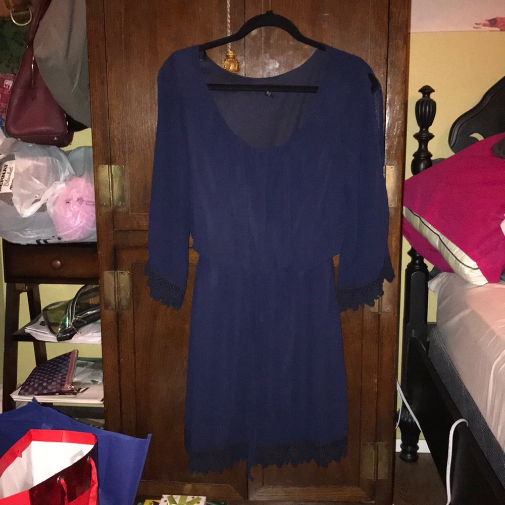 Navy dress with arm slit and lace details